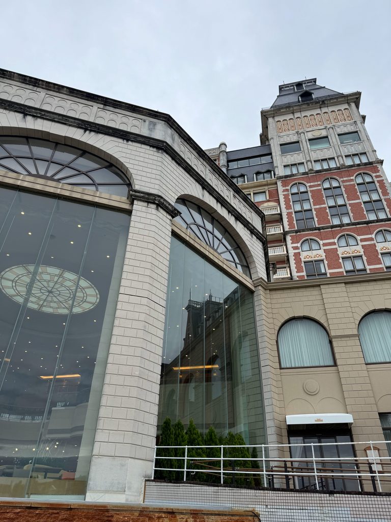 Glass-roofed atrium and European-style facades at Hotel Okura JR Huis Ten Bosch
